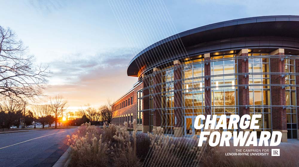 George Hall at sunset with Charge Forward campaign